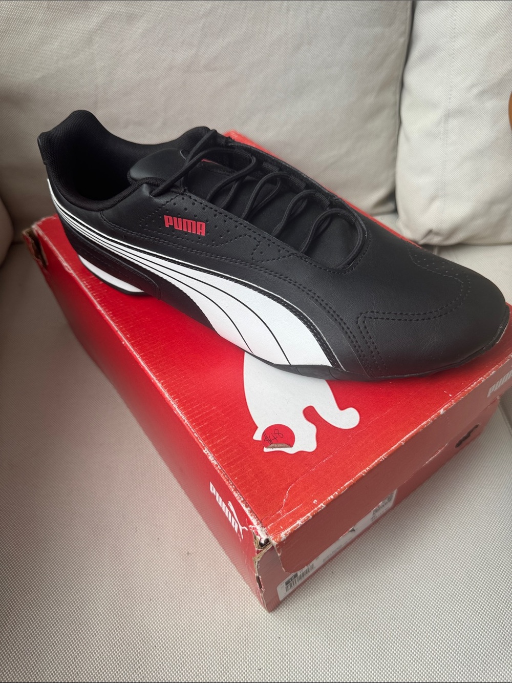 Puma Men’s Black Sneaker with White Formstrip and Red Logo